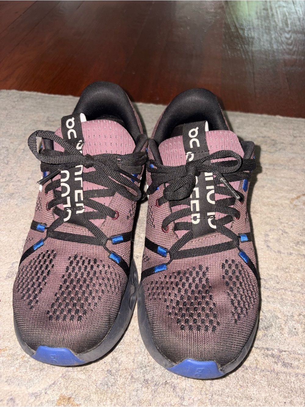 On Running Sneakers in Black with Blue Highlights
